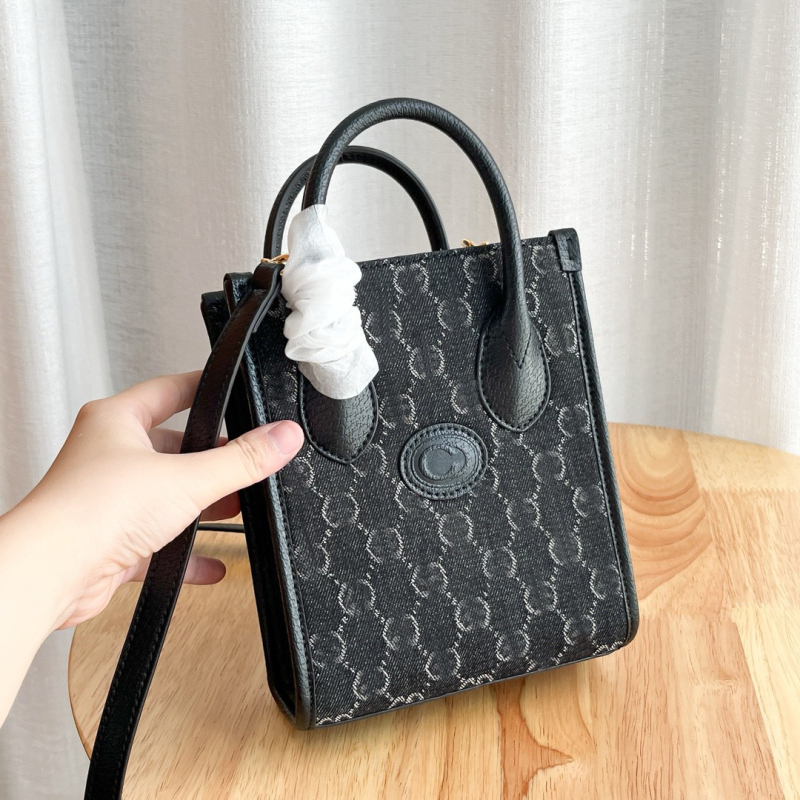 G-brand kožna retro tote torba za partituru – monogram uzorak (Materijal: prava koža; Podstava: platno; Oblik: uspravni kvadrat; Remenje: dvostruka; ID pretinac)