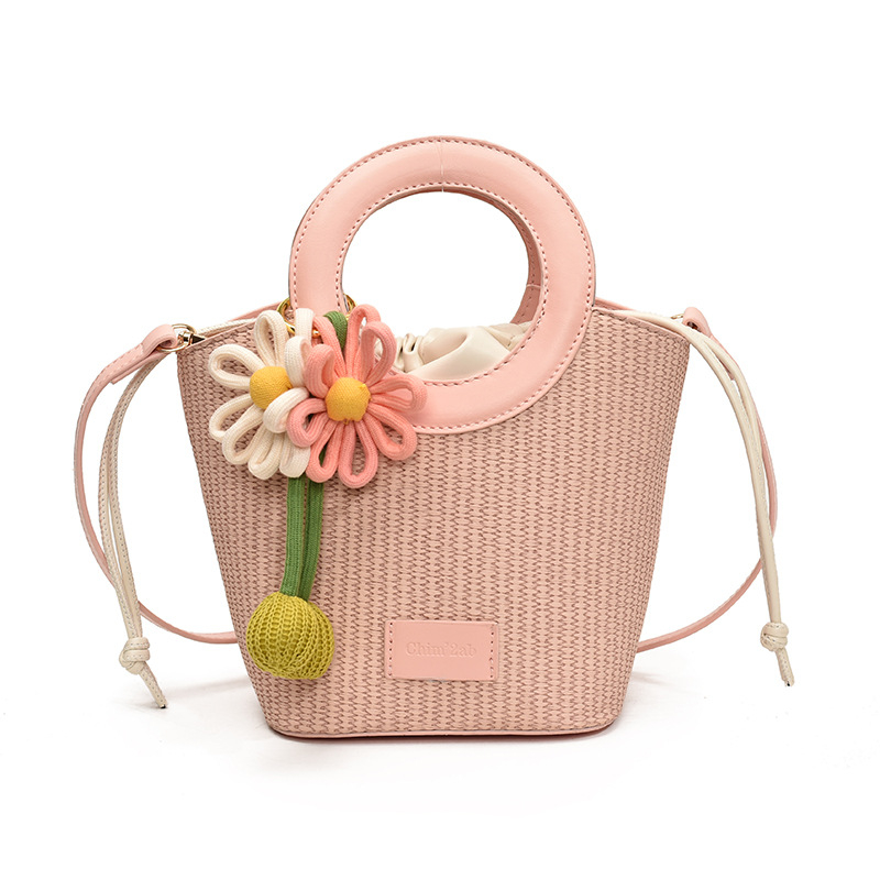 PU materijal crossbody torbica u bucket bag stilu, gradski minimalistički dizajn, pravokutnog oblika, zatvaranje šnira, unutarnji džepovi