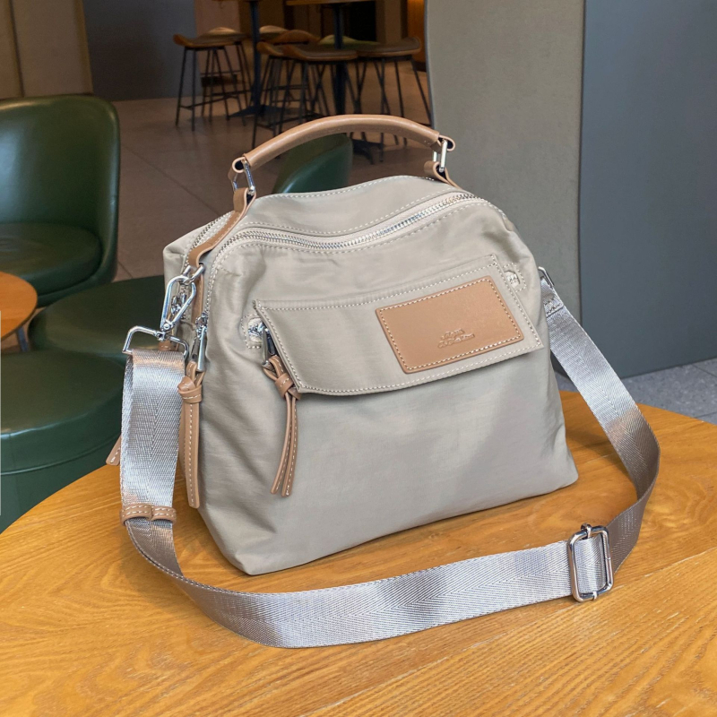 Mukari ženska crossbody torba od Oxford platna, s pretincom za telefon i laminiranim džepom sa zatvaračem, horizontalni kvadratični oblik, zatvaranje na zip