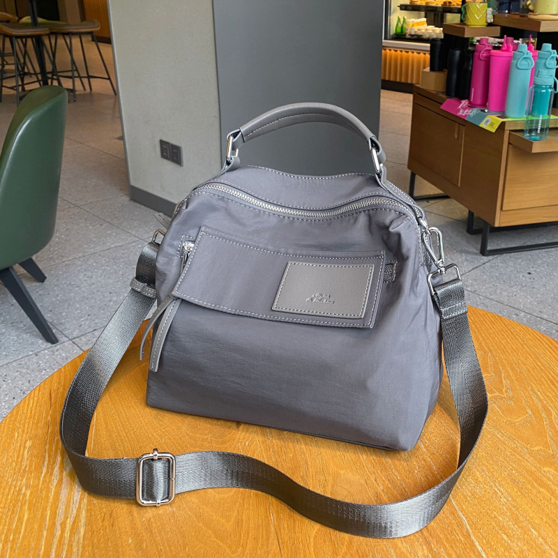 Mukari ženska crossbody torba od Oxford platna, s pretincom za telefon i laminiranim džepom sa zatvaračem, horizontalni kvadratični oblik, zatvaranje na zip