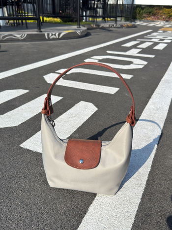 Ženska crossbody torbica s dumpling oblikom, od oxford platna, gradski minimalistički stil, zip zatvarač, poliester podstava
