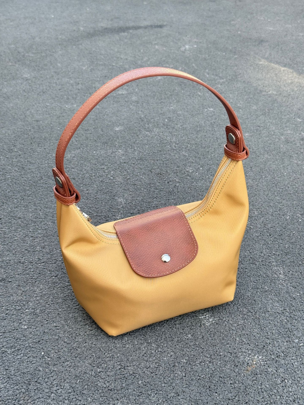 Ženska crossbody torbica s dumpling oblikom, od oxford platna, gradski minimalistički stil, zip zatvarač, poliester podstava