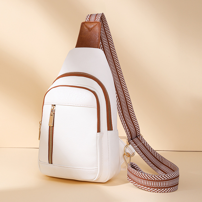 Crossbody táska, Corduroy anyag, cipzáras zárás, poliészter bélés, belső dokumentumrekesz és cipzáras rekesz, 2026 tavasz megjelenés