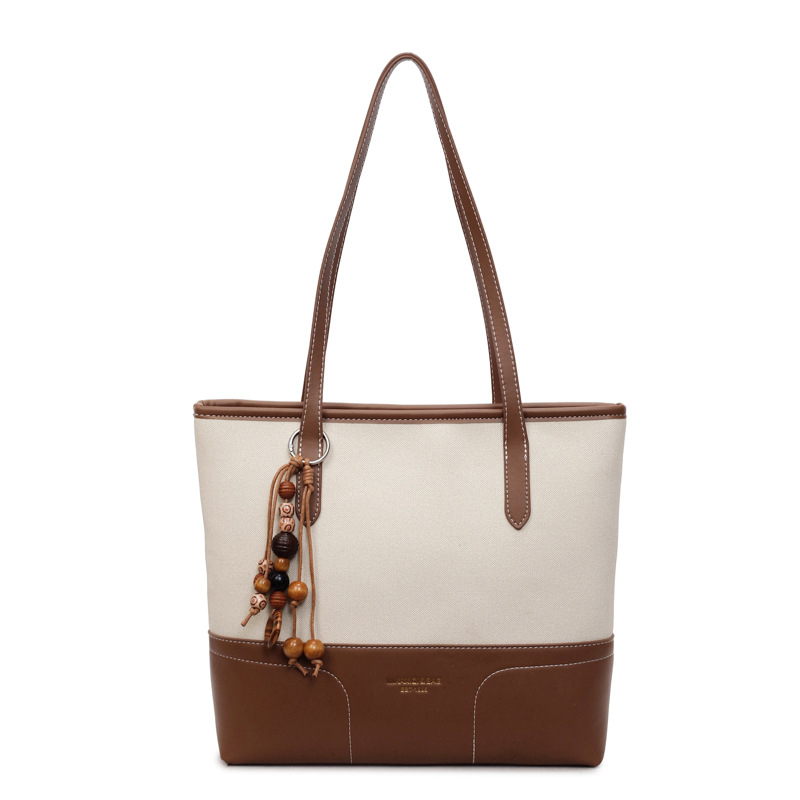 Városi minimalist stílusú PU tote táska, cipzárral nyitás, belső zsebek: rejtett cipzáras zseb és irattartó zseb, 2026 tavasz