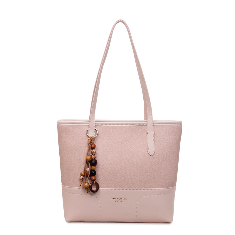 Városi minimalist stílusú PU tote táska, cipzárral nyitás, belső zsebek: rejtett cipzáras zseb és irattartó zseb, 2026 tavasz