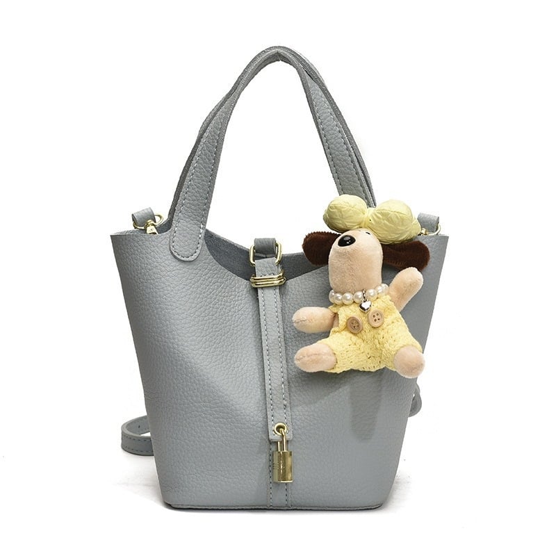 Geantă bucket pentru femei – stil stradal, material PU, închidere magnetică, buzunar cu fermoar, căptușeală din poliester, formă bucket, vara 2025