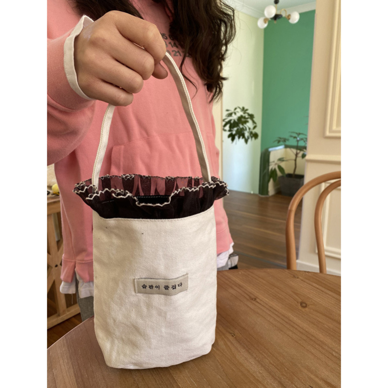 Geantă tip găleată din canvas, stil urban, formă găleată, deschidere deschisă, căptușeală din canvas