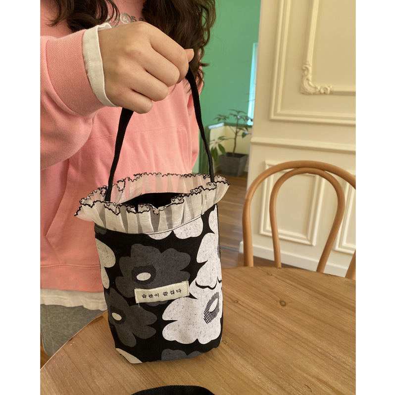 Geantă tip găleată din canvas, stil urban, formă găleată, deschidere deschisă, căptușeală din canvas