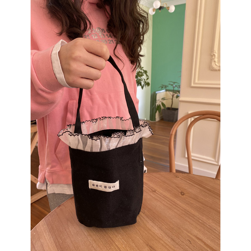 Geantă tip găleată din canvas, stil urban, formă găleată, deschidere deschisă, căptușeală din canvas