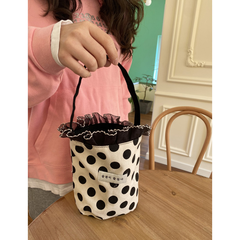 Geantă tip găleată din canvas, stil urban, formă găleată, deschidere deschisă, căptușeală din canvas