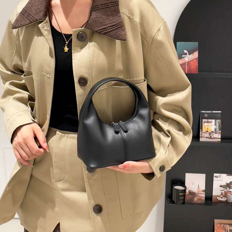 Ženska bucket torba s urbanim minimalistom, PU materijal, zatvaranje na zip, poliester podstava