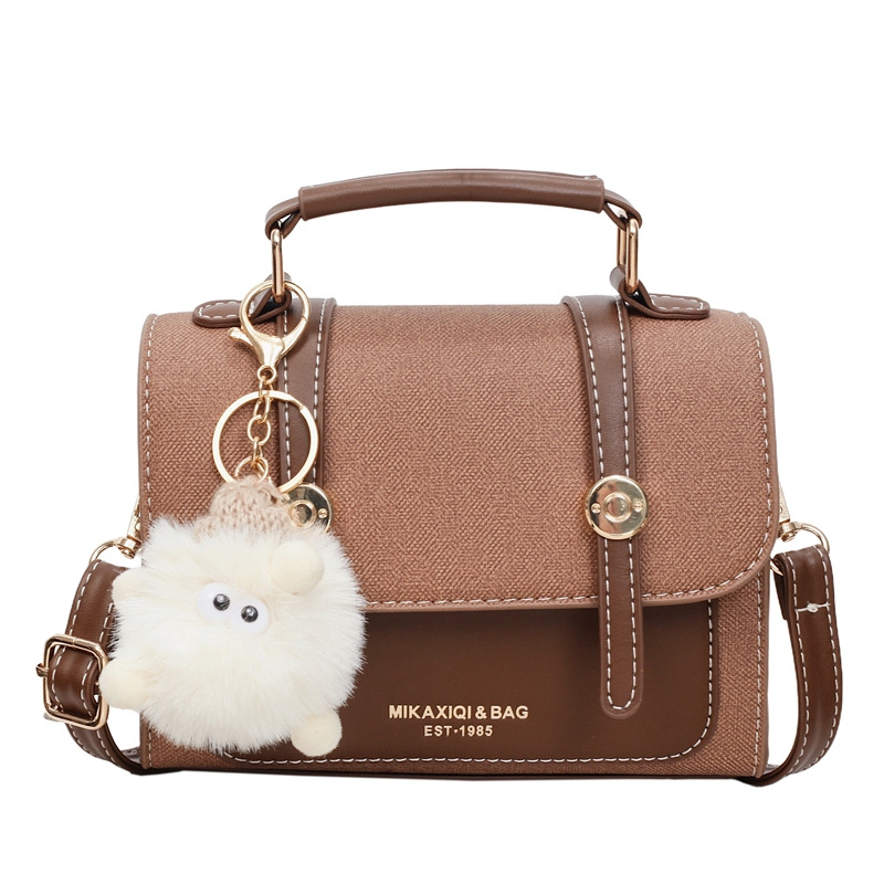 Crossbody torba, gradski minimalistički stil; Materijal PU; Horizontalni kvadratni oblik; Zatvaranje s klapnom; Unutarnja struktura: skriveni džep sa zatvaračem
