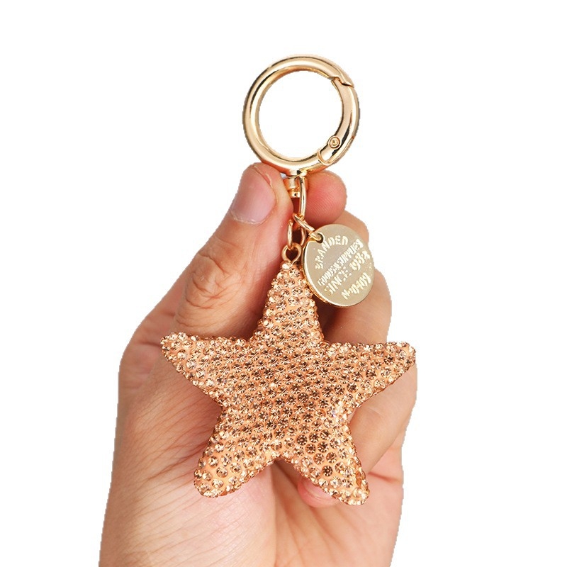 Kulcstartó Rhinestone pentagram kristállyal, aranyos stílusú lányoknak, autókulcstartó, táskára függő medál — édes ajándék