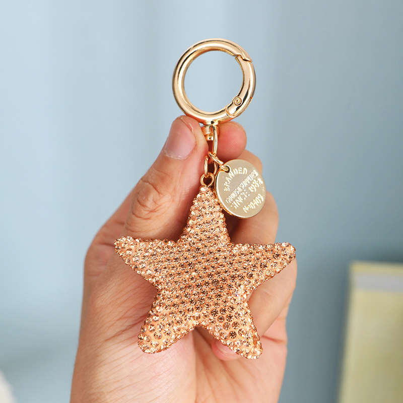 Kulcstartó Rhinestone pentagram kristállyal, aranyos stílusú lányoknak, autókulcstartó, táskára függő medál — édes ajándék