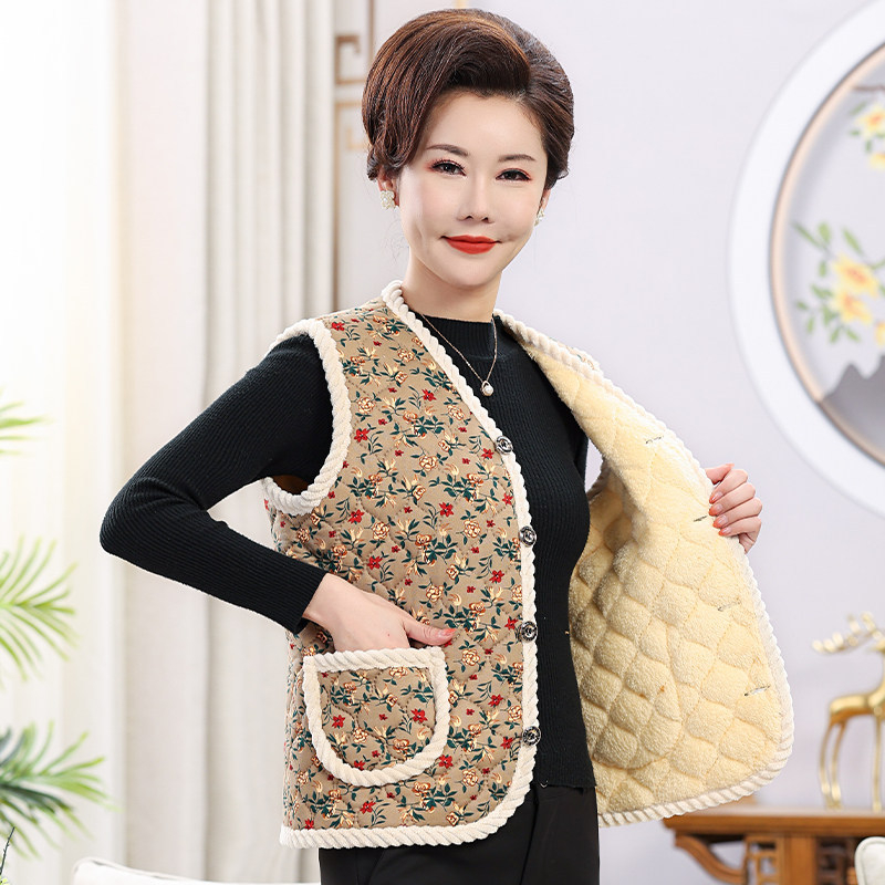 Vesta din bumbac amestec cu broderie, decolteu în V, lungime standardă 50–65 cm, croială în A-line