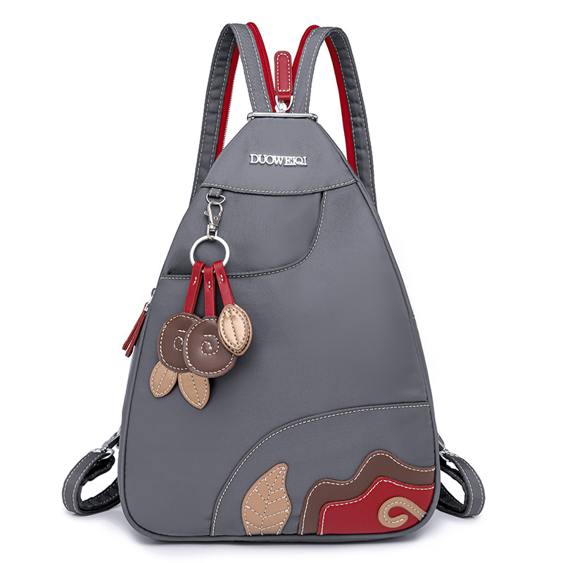 Σακίδιο πλάτης — ελαφρύ και μετατρέψιμο σε δύο τρόπους φορέματος (ως ράντζα ή crossbody), ύφασμα Oxford, κλείσιμο με φερμουάρ, εσωτερική τσέπη με patch, διαμερίσματα, για καθημερινή χρήση