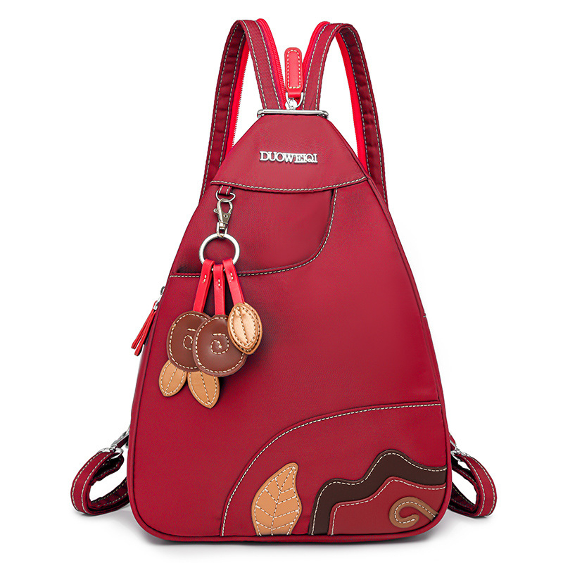 Σακίδιο πλάτης — ελαφρύ και μετατρέψιμο σε δύο τρόπους φορέματος (ως ράντζα ή crossbody), ύφασμα Oxford, κλείσιμο με φερμουάρ, εσωτερική τσέπη με patch, διαμερίσματα, για καθημερινή χρήση