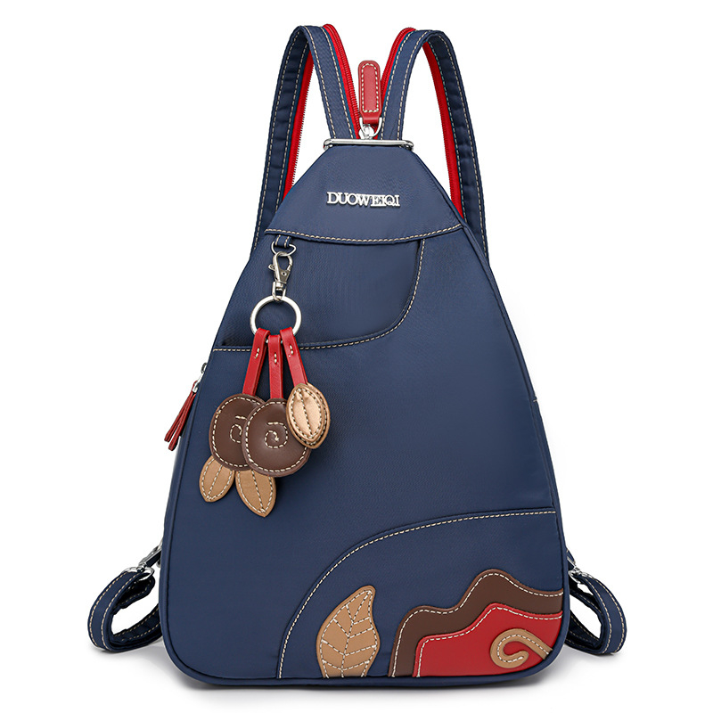 Σακίδιο πλάτης — ελαφρύ και μετατρέψιμο σε δύο τρόπους φορέματος (ως ράντζα ή crossbody), ύφασμα Oxford, κλείσιμο με φερμουάρ, εσωτερική τσέπη με patch, διαμερίσματα, για καθημερινή χρήση