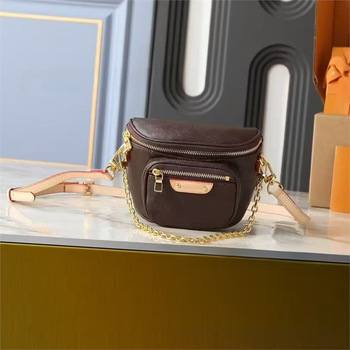Crossbody torbica od prave kože, okruglog oblika, zatvaranje zipom, dvostruki remen
