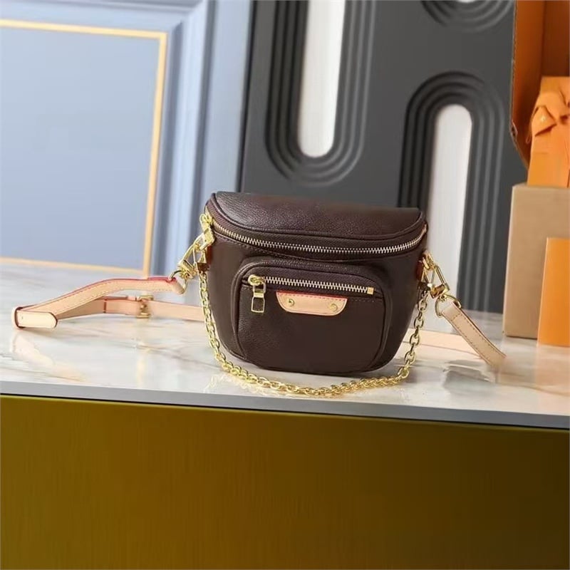 Crossbody torbica od prave kože, okruglog oblika, zatvaranje zipom, dvostruki remen