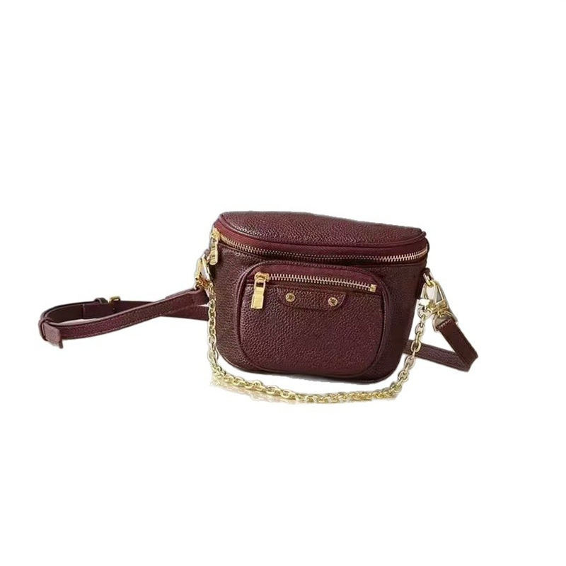Crossbody torbica od prave kože, okruglog oblika, zatvaranje zipom, dvostruki remen