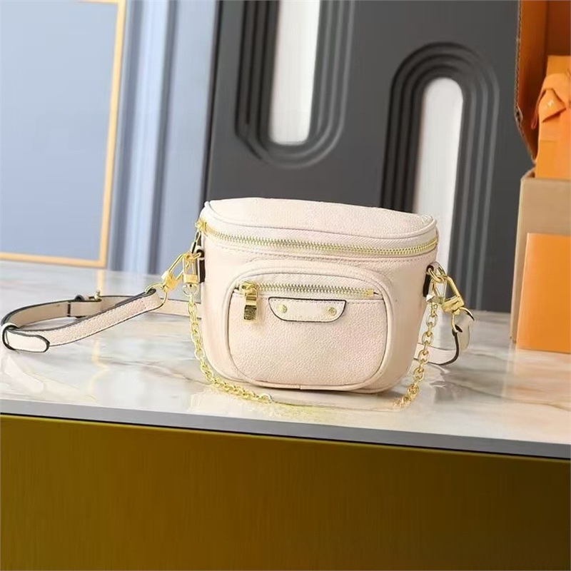 Crossbody torbica od prave kože, okruglog oblika, zatvaranje zipom, dvostruki remen
