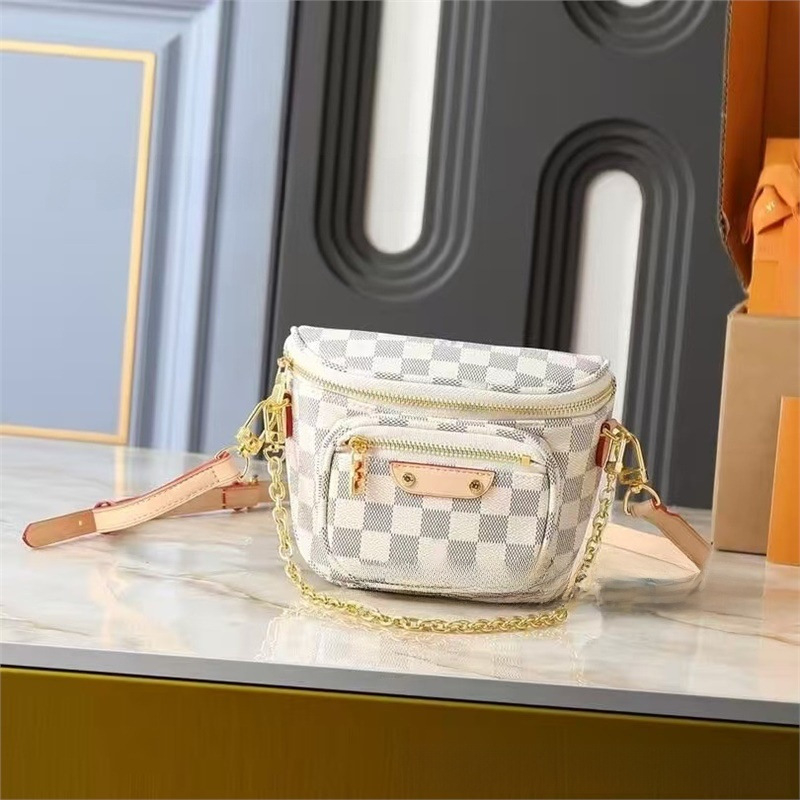 Crossbody torbica od prave kože, okruglog oblika, zatvaranje zipom, dvostruki remen
