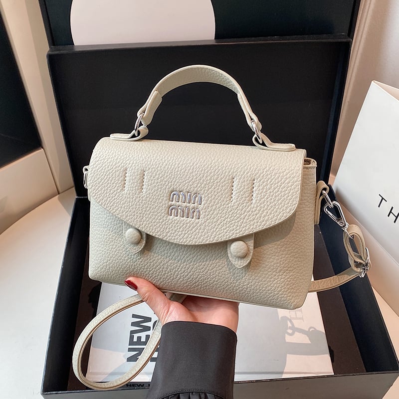 PU crossbody torbica, mala kvadratna silueta, zatvarač, unutarnji džep za telefon, poliester podstava, šifra proizvoda YY8007.