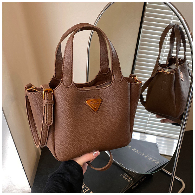 Női PU anyagú vödörtáska, városi egyszerű stílus, zipzáras záródás, belső cipzáros zseb, poliészter bélés