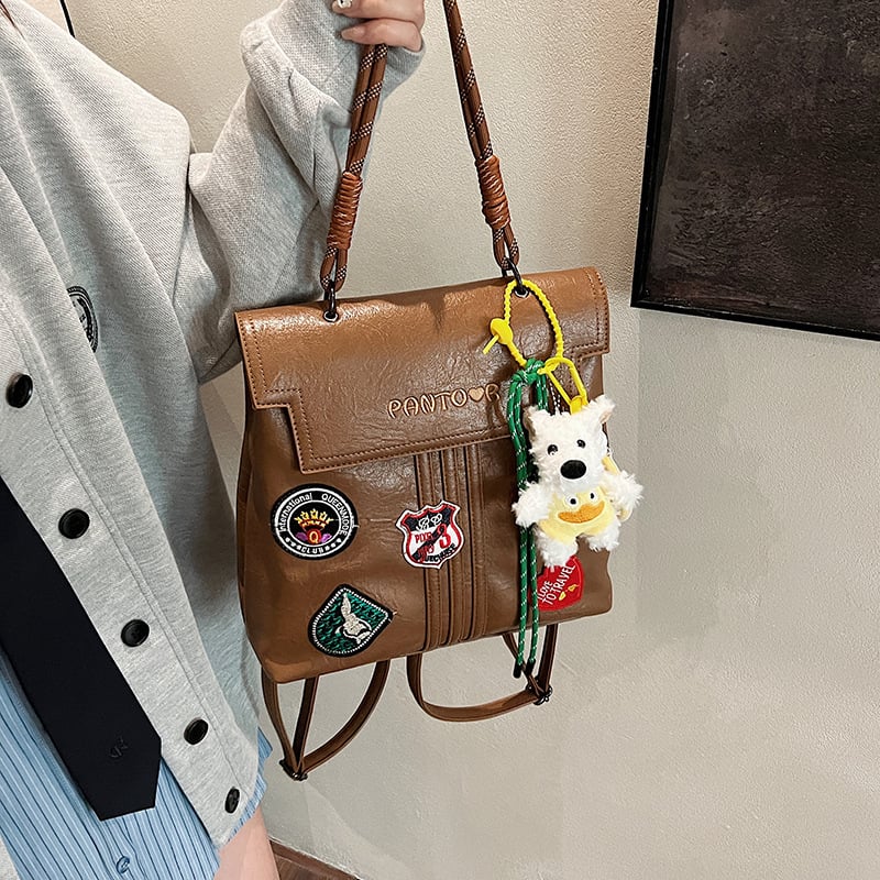 Ženski ruksak s oznakom, PU materijal, vertikalni kvadratni oblik, magnetsko kopčanje, unutarnja džep s zipom i džep za mobitel, dvostruke naramenice, zimska sezona