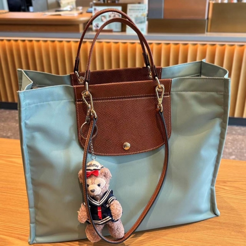 Laptop torba - ulični stil, koža od kravljeg split-a, kutijastog oblika, unutarnji džepovi za telefon, laptop i kameru