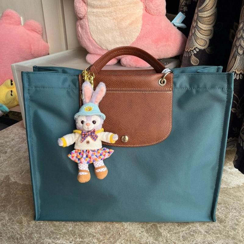 Laptop torba - ulični stil, koža od kravljeg split-a, kutijastog oblika, unutarnji džepovi za telefon, laptop i kameru