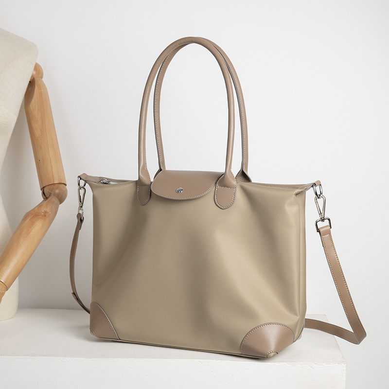 Női laptop táska, nylon Tote nagy kapacitással, keresztpántos hordozás, városi minimalist stílus, belső rekeszek: cipzáros zseb, telefontartó zseb, ID-zseb, laptop-zseb