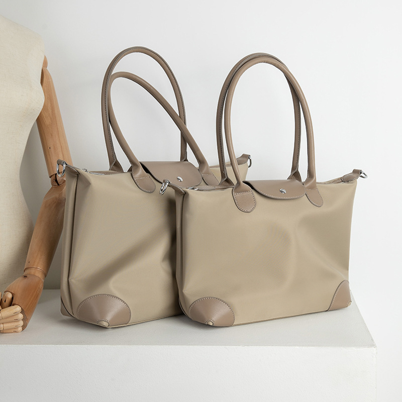 Női laptop táska, nylon Tote nagy kapacitással, keresztpántos hordozás, városi minimalist stílus, belső rekeszek: cipzáros zseb, telefontartó zseb, ID-zseb, laptop-zseb