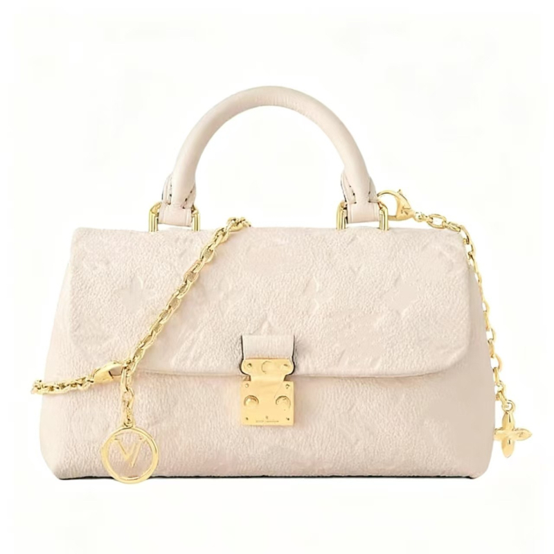 Bucket torba od prave kože s lychee-grain teksturom, zatvaranje kopčom, skriveni džep sa zipom, platnena podstava