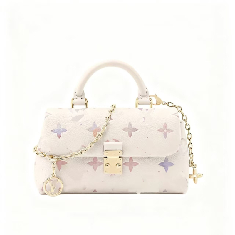 Bucket torba od prave kože s lychee-grain teksturom, zatvaranje kopčom, skriveni džep sa zipom, platnena podstava