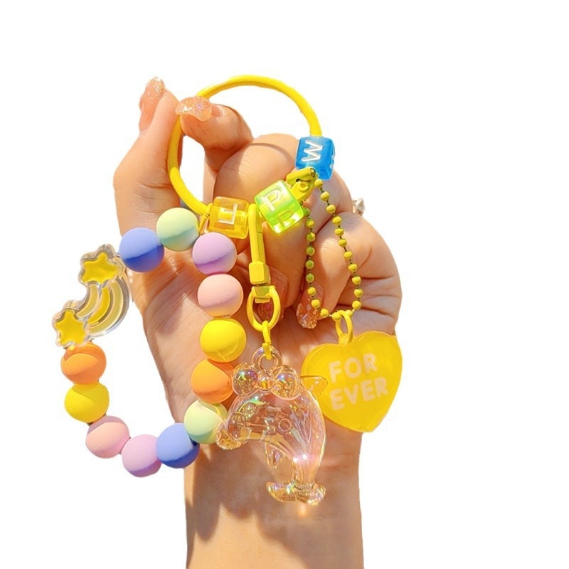 Gyantából készült kulcstartó delfin gyöngyökkel - rajzfilmszerű stílus, ideális ajándék