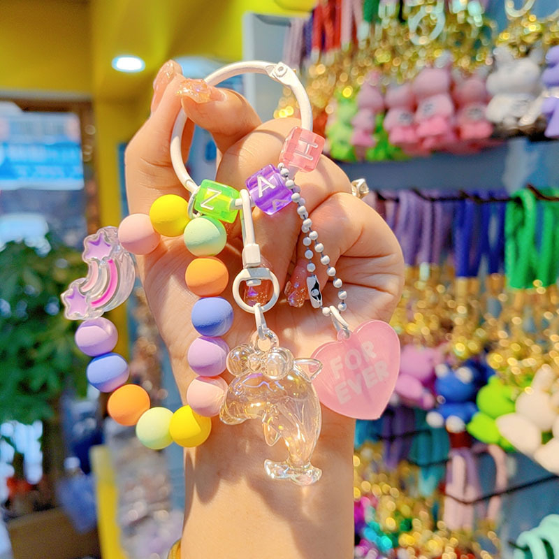 Gyantából készült kulcstartó delfin gyöngyökkel - rajzfilmszerű stílus, ideális ajándék