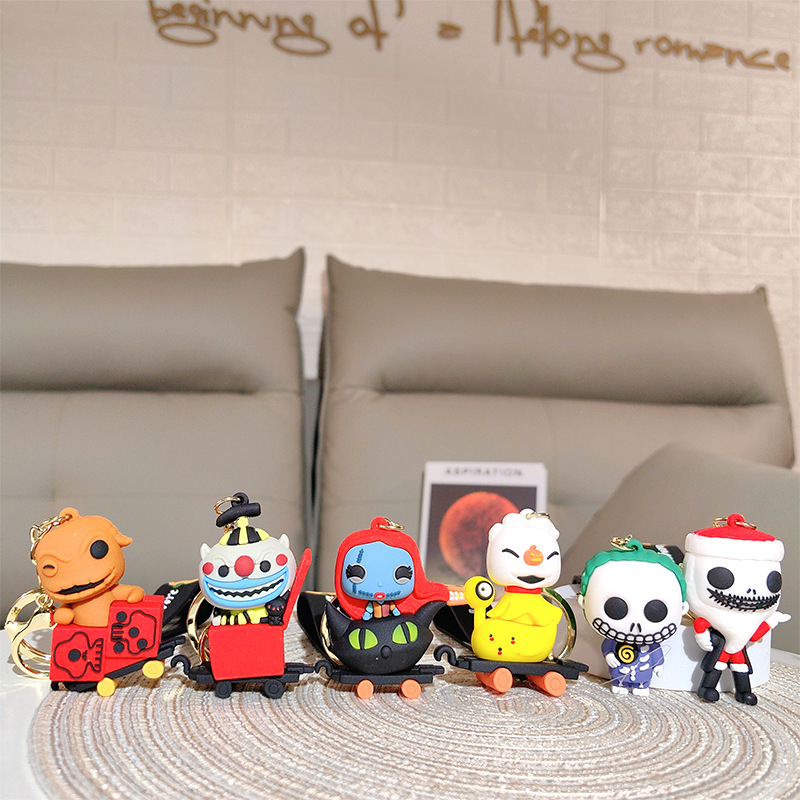 PVC kulcstartó aranyos csontváz bohóc rajzfilmszerű figurával, táska függő, üzleti ajándék