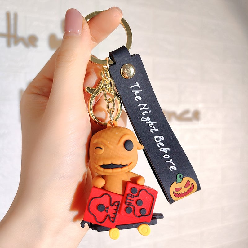 PVC kulcstartó aranyos csontváz bohóc rajzfilmszerű figurával, táska függő, üzleti ajándék