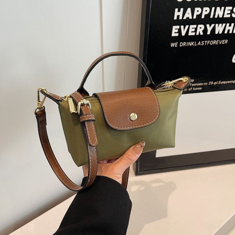 Mini crossbody torba od Oxford materijala, s nylonom unutarnjom podlogom, horizontalni kvadratni oblik, zatvaranje zipom, unutarnja džep sa zipom, gradski minimalistički stil