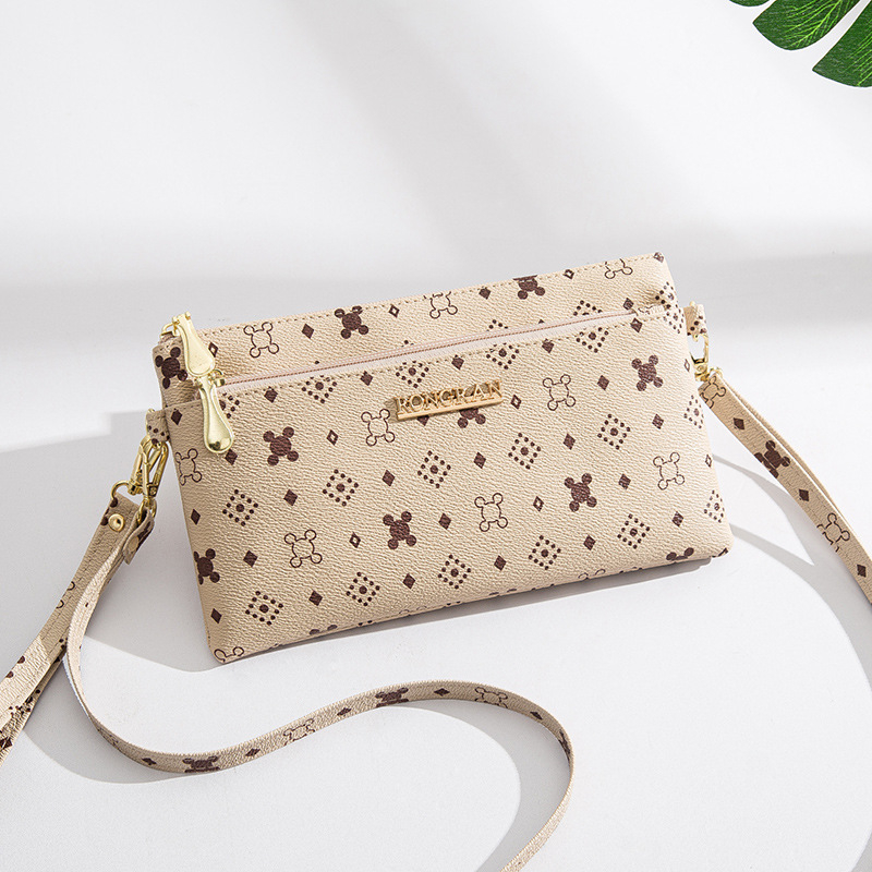 PU kvadratna torba preko ramena, crossbody stil, zatvarač, poliester podstava, unutarnji pretinci za telefon i ID