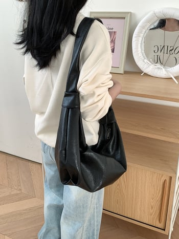 Dumpling-stil crossbody torba od PU, mekana koža, zatvaranje na zip, unutarnja zip torbica i džep za mobitel, poliester podstava, jedna naramenica, gradski minimalistički stil, proljeće 2025