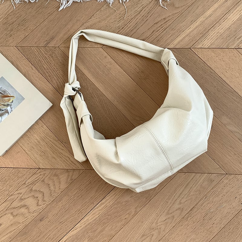 Dumpling-stil crossbody torba od PU, mekana koža, zatvaranje na zip, unutarnja zip torbica i džep za mobitel, poliester podstava, jedna naramenica, gradski minimalistički stil, proljeće 2025