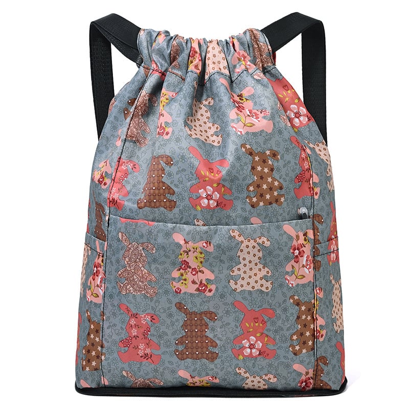 Σακίδιο με κορδόνι σε αστικό στυλ από Oxford ύφασμα, με εσωτερικό θήκη με φερμουάρ και πολυεστερική επένδυση, διπλώνεται για αποθήκευση