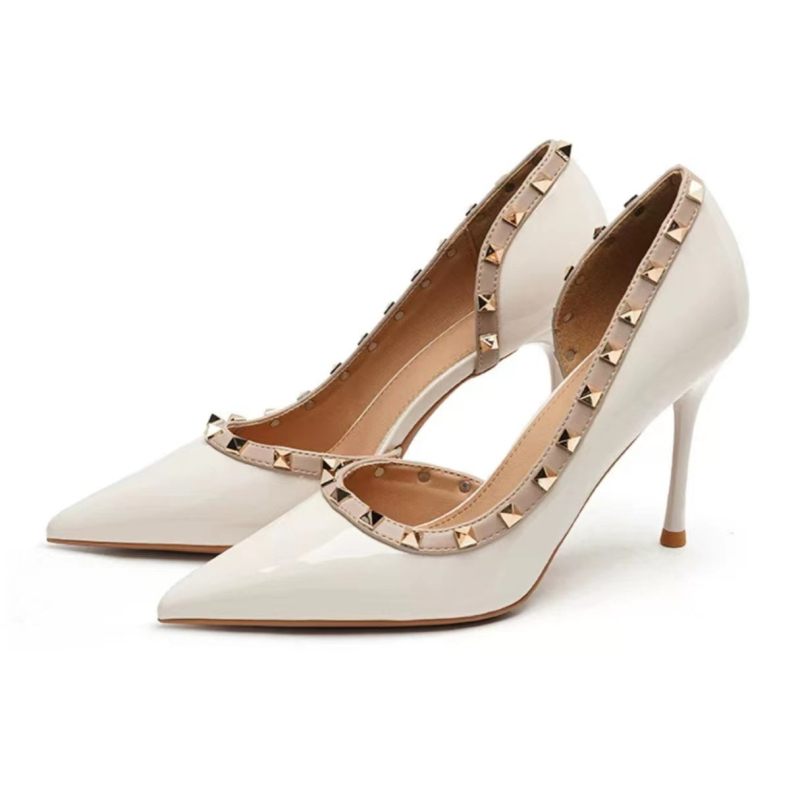 Дамски високи токчета с пирони, заострен нос и странични прорези, микрофибър кожа (горна част) и супер влакна вътрешност, гумена подметка, ток 6–8 cm