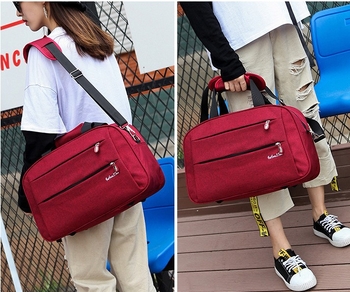 Cestovná taška z Oxfordu, objem 36–55 L, otváranie na zips, teleskopická rukoväť, jedna ramenná popruh, vnútorné vrecká pre notebook a fotoaparát