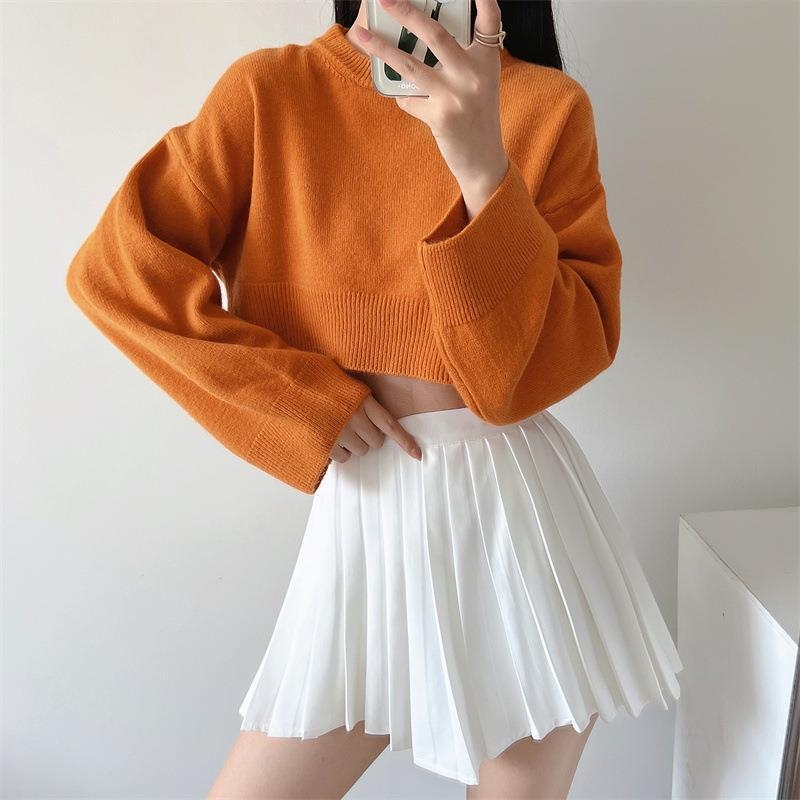 Πλεκτό πουλόβερ από μείγμα κασμίρ με πολυεστέρα και νάιλον, με στρογγυλό λαιμό, μακριές μανίκια, χαλαρή γραμμή, λεπτομέρεια κολλάζ ραφές