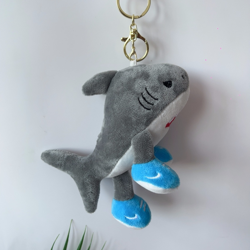 Jingjin плюшена подвесна кукла — полиестерно влакно, пълнеж ПП памук, супер мека къса плюш, мрежеста торбичка за опаковка, за възраст 7–14 години.