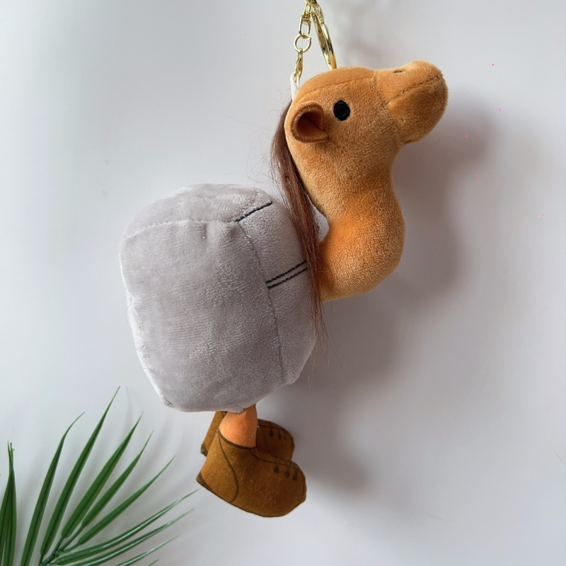 Jingjin плюшена подвесна кукла — полиестерно влакно, пълнеж ПП памук, супер мека къса плюш, мрежеста торбичка за опаковка, за възраст 7–14 години.